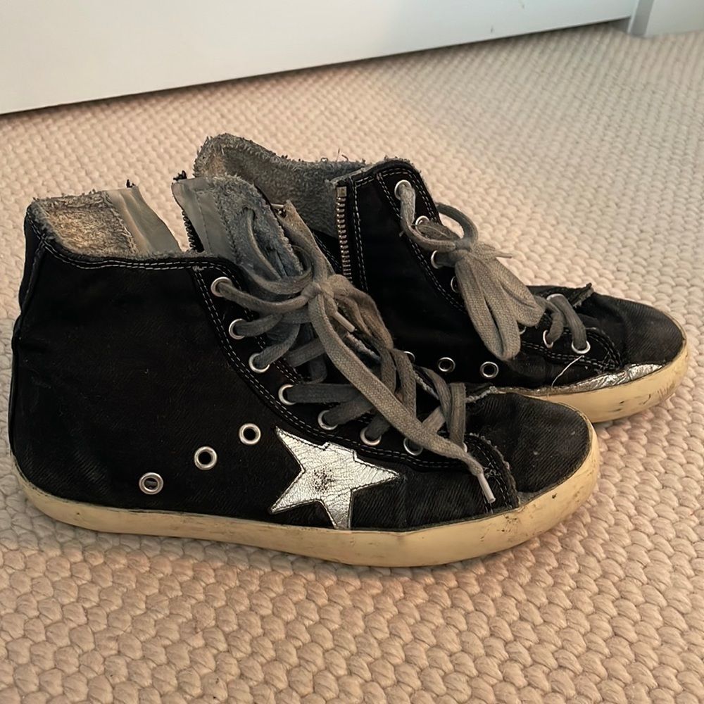 Golden Goose high top sneakers.
